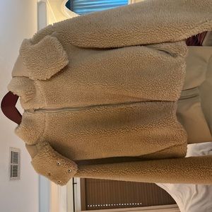 AOL XS fuzzy jacket. Wore one time in excellent condition.